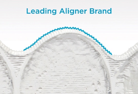 Spark aligner edge, smooth and scalloped to follow the gumline